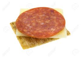 A Slice Of Cheddar Cheese And Pepperoni Upon A Whole Wheat Cracker.. Stock  Photo, Picture And Royalty Free Image. Image 50735688.